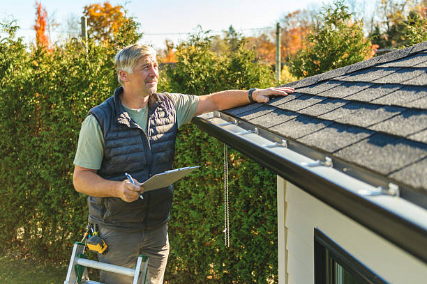 Professional Roof Replacement technician working in Hettinger, ND